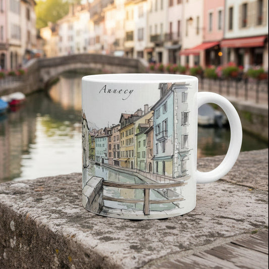 Aquarellillustration der Altstadt von Annecy zwischen Bergen und Wasser