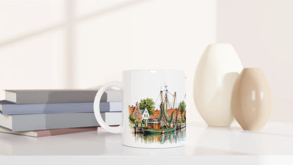 Die beiden Greetsieler Zwillingsmühlen als detailreiche Aquarellillustration mit großen Mühlenflügeln, rotem Mauerwerk und grüner ostfriesischer Landschaft