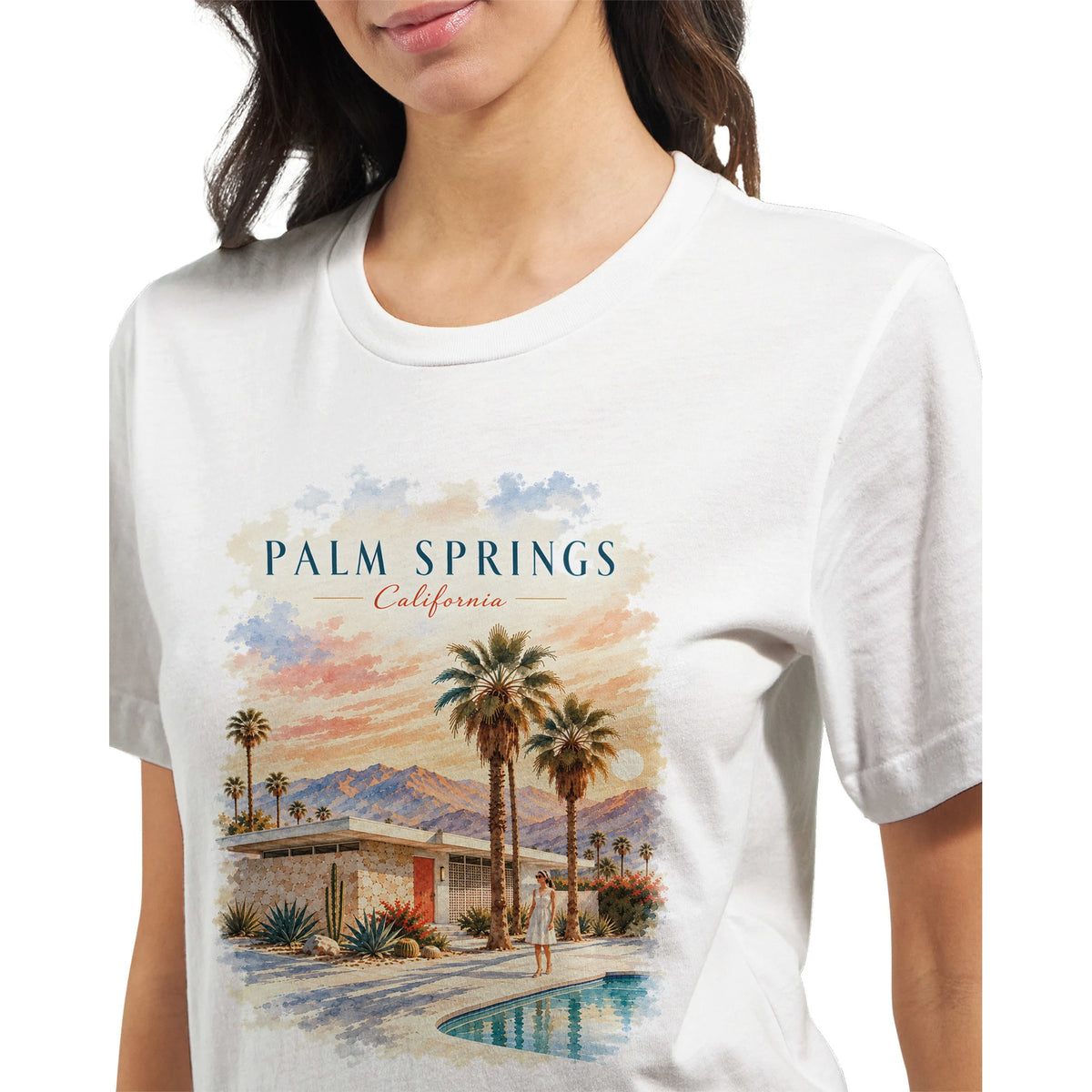 Unisex-Printshirt mit sommerlicher Palm-Springs-Szene: Ein Pool, Palmen und die warme Atmosphäre der kalifornischen Wüste prägen das Mid-Century-Motiv.