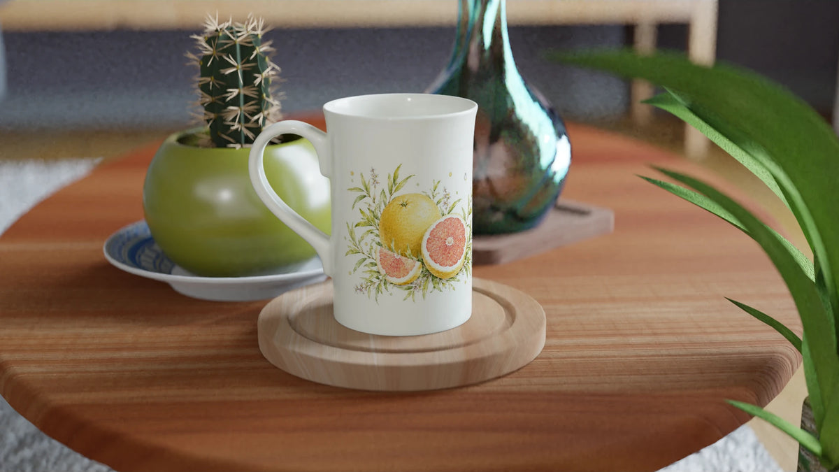 Pampelmuse Tasse 295 ml mit gelber Schale, rosafarbenem Fruchtfleisch und hellem botanischem Aquarellmotiv