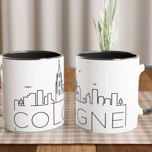 Skyline Köln Tasse 330 ml aus Keramik in Weiß mit schwarzem Innenbereich und schwarzem Henkel, minimalistisches Line-Art-Motiv mit Kölner Dom und Stadtsilhouette